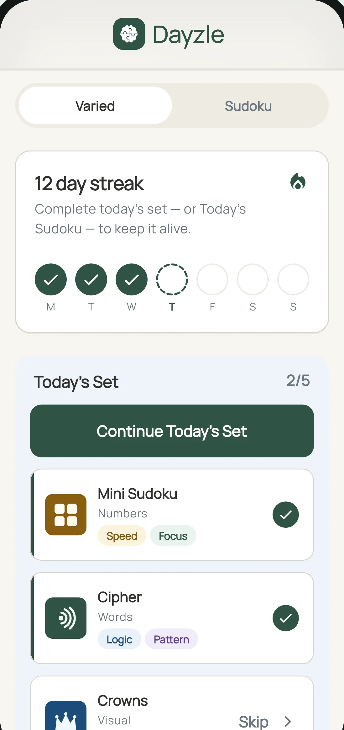 The Dayzle home screen: a 12 day streak, Today's Set at 2 of 5 complete, and a Continue today's set button